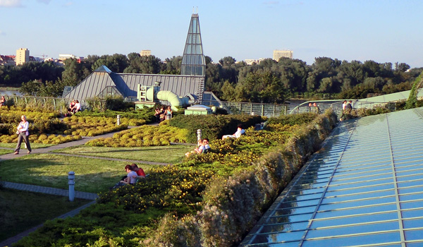 People relaxing in a park situated on a roof