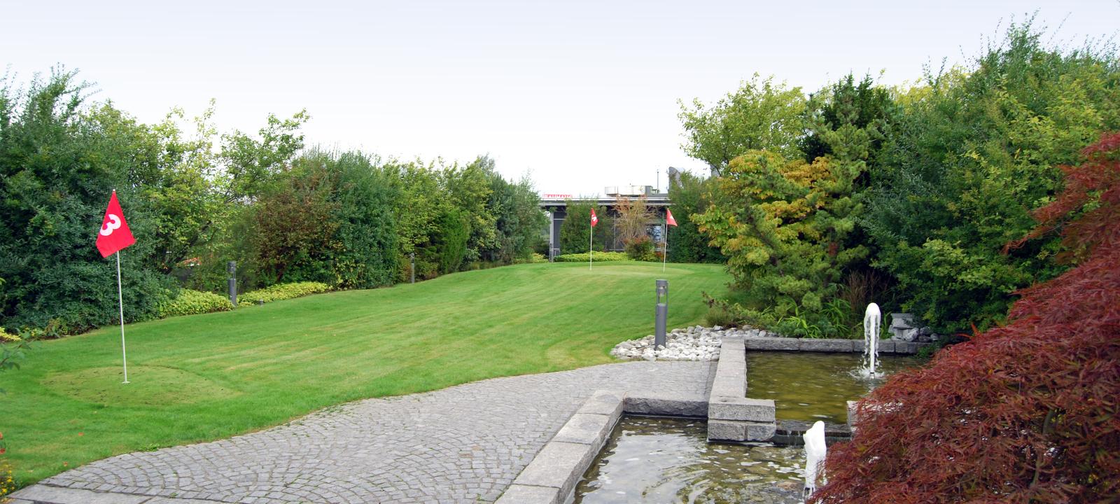 Roof garden with golf course and water basin