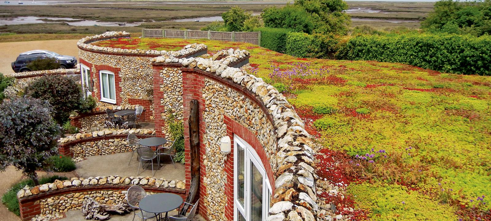 Natural stone buildings with Sedum roof